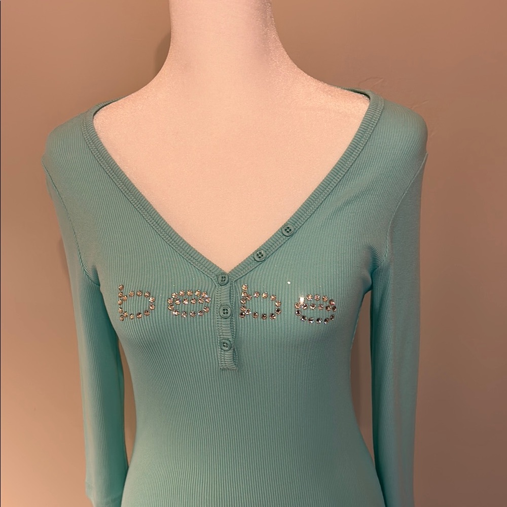 Bebe Aqua V-Neck Top with Embellished Logo